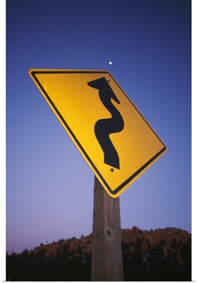 Road Sign With Arrow Pointing To Moon