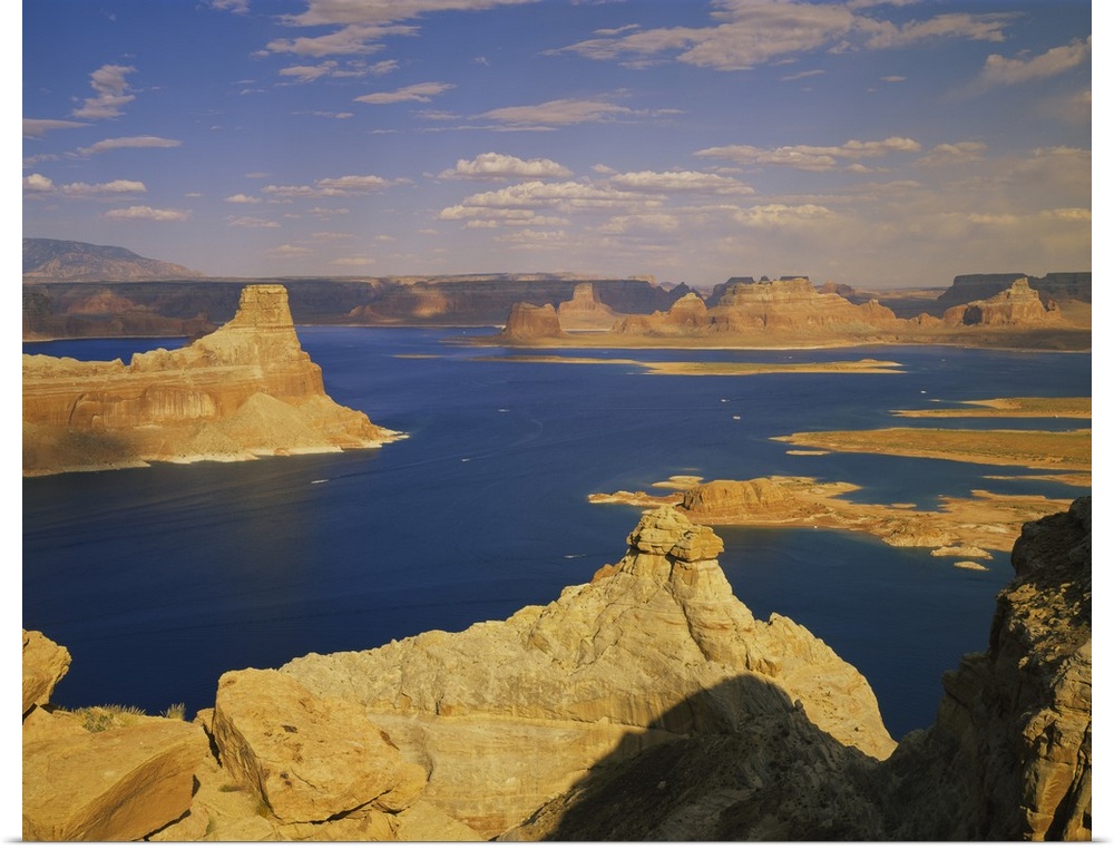 Rock formations at a lake, Gunsight Butte, Lake Powell, Glen Canyon National Recreation Area, Arizona, Utah