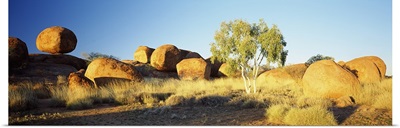 Rock formations on a landscape, Devils Marbles, Northern Territory, Australia