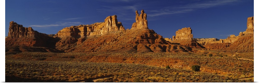 Rock formations on a landscape, Monument Valley Tribal Park, Monument Valley, Arizona