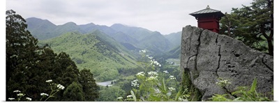 Rock in front of a valley, Yamadera, Yamagata Prefecture, Honshu, Japan
