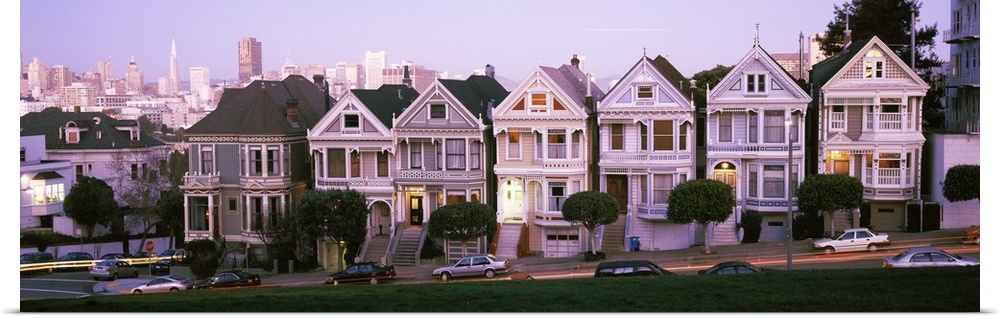 Row houses in a city, Postcard Row, The Seven Sisters, Painted Ladies, Alamo Square, San Francisco, California,
