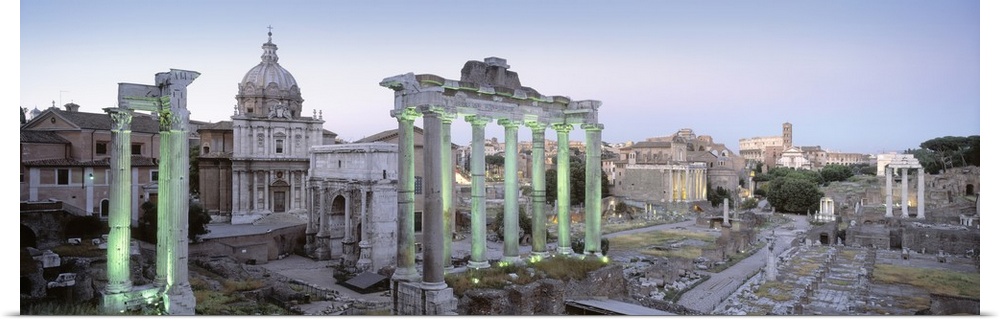 Columns and ruins in Italy are pictured in panoramic view.