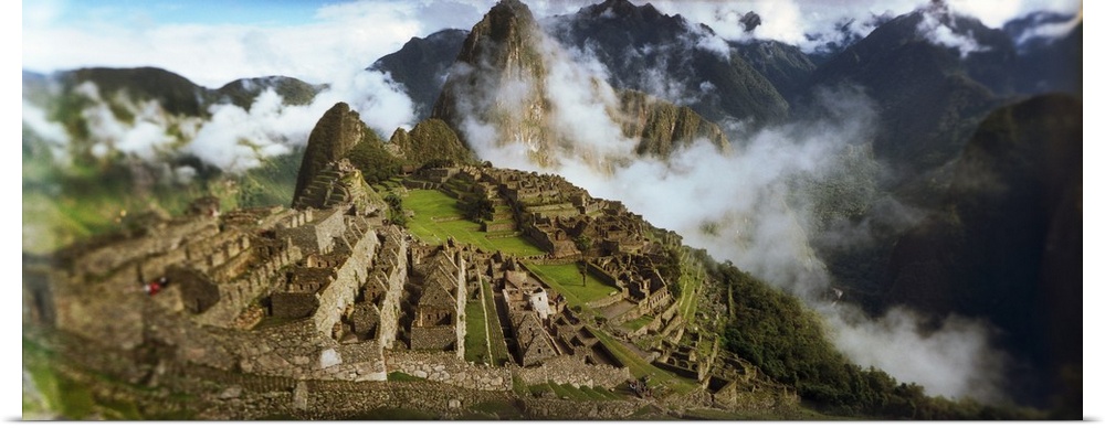 Ruins of buildings at an archaeological site Inca Ruins Machu Picchu Cusco Region Peru