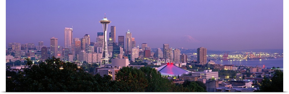 Panoramic view of the Seattle, Washington skyline in the early evening, with the Space needle clearly visible in the cente...