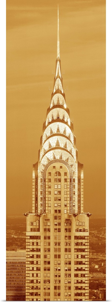 This is a sepiatone close up of the Chrysler Building at sunset. It is the view from 42nd Street and 5th Avenue.