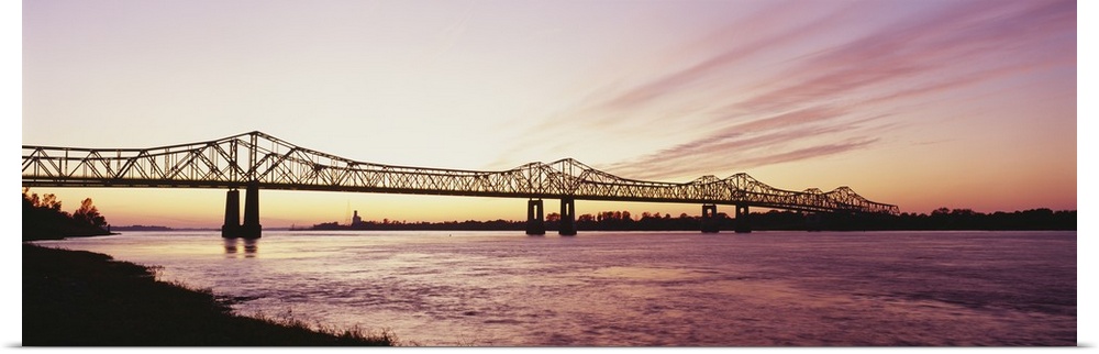 Silhouette of a bridge over a river, Crescent City Connection Bridge, Mississippi River, Natchez, Mississippi