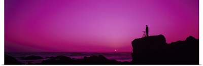 Silhouette of a cyclist at the coast, North Coast, California,