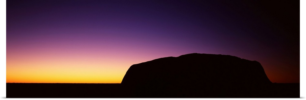 Silhouette of Ayers Rock formations on a landscape, Northern Territory, Australia