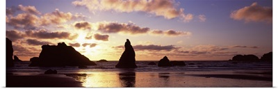 Silhouette of rock formation in the ocean Bandon Beach Bandon Coos County Oregon