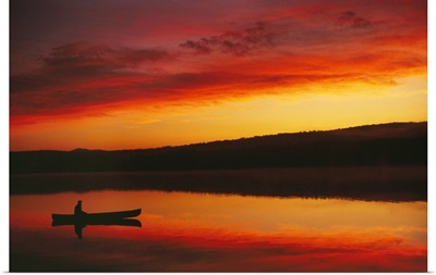 Silhouetted Canoe On Lake