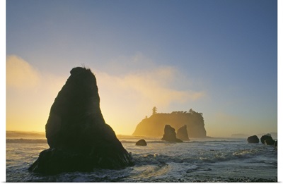 Silhouetted Sea Stacks In Pacific Ocean