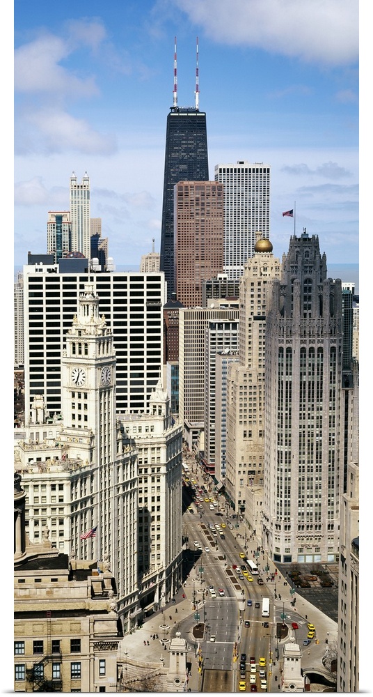 Michigan Avenue is pictured from above with a high angle view of the skyscrapers in the city.