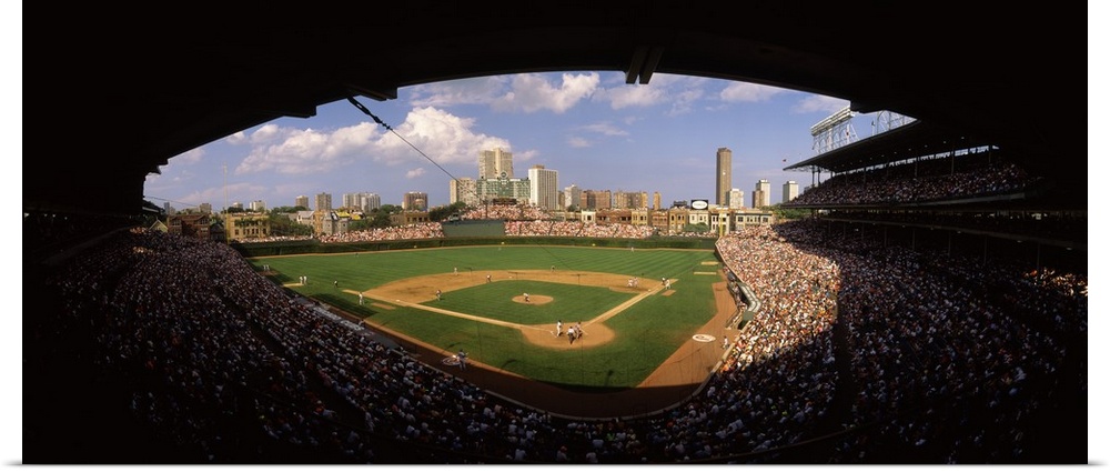 Panoramic photograph taken from a section way behind home plate shows the historic ballpark and stands for a National Leag...