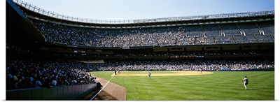 Spectators watching a baseball match in a stadium, Yankee Stadium, New York City, New York State