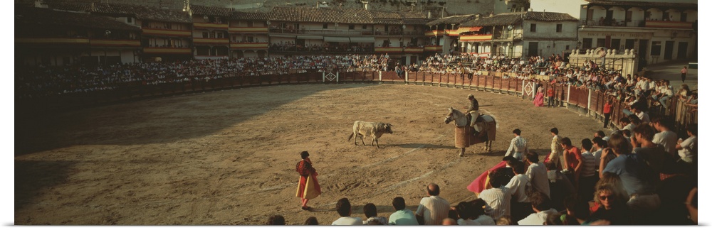 Spectators watching bullfighting in a stadium, Spain