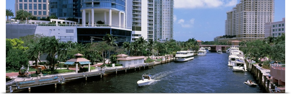 Speedboat and yachts in a canal, Fort Lauderdale, Broward County, Florida