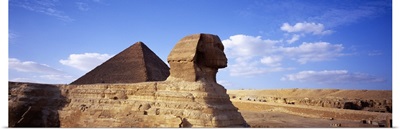 Sphinx in front of a pyramid, Great Pyramid, Giza, Cairo, Egypt