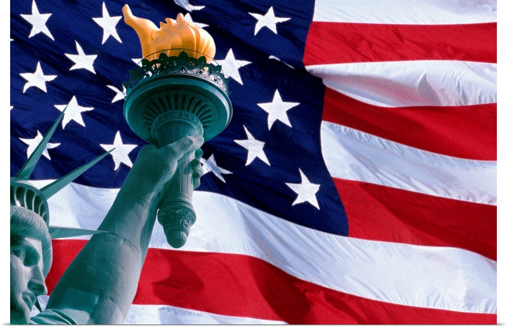 Large, landscape photograph of the American Flag, the face of the Statue of Liberty in the bottom corner, holding the torch.
