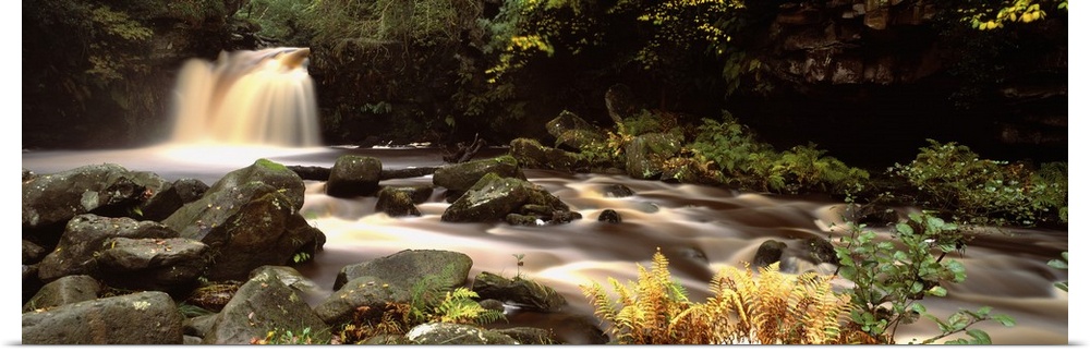 Stream flowing through rocks, Thomason Foss, Goathland, North Yorkshire, England