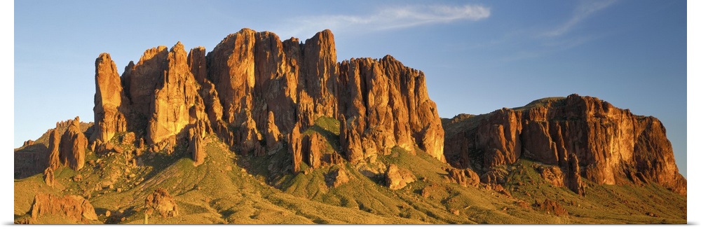 Large Panoramic shot of desert mountains shooting up in the barren flats of Arizona.
