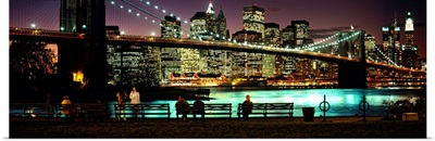Suspension bridge lit up at dusk, Brooklyn Bridge, East River, Manhattan, New York City, New York State