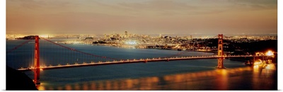 Suspension bridge lit up at dusk Golden Gate Bridge San Francisco Bay San Francisco California