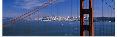 Suspension bridge with a city in the background, Golden Gate Bridge, San Francisco, California,
