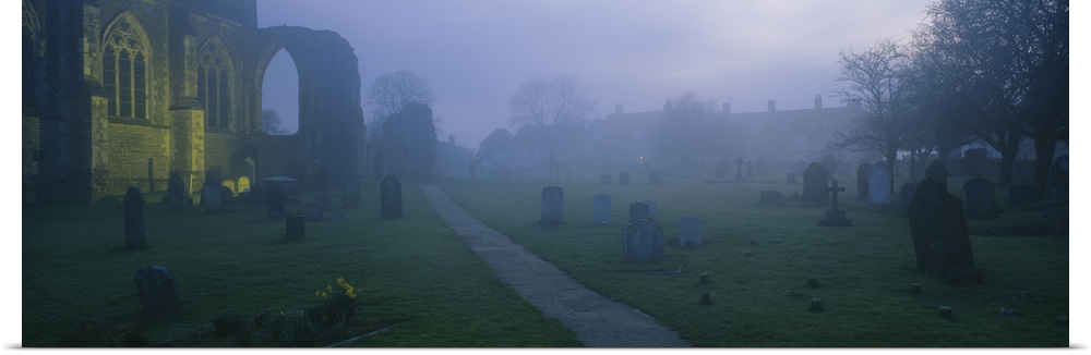 Tombstones in a cemetery, Winchelsea, East Sussex, England