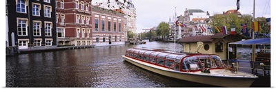 Tourboat in a channel, Amsterdam, Netherlands