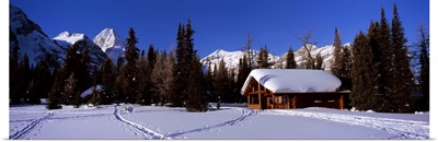 Tourist lodge in a snow covered field, Naiset Cabins and Huts, Mt Assiniboine Provincial Park, British Columbia, Canada
