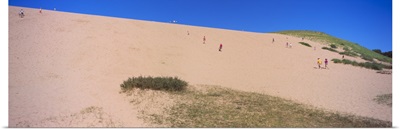Tourists climbing a sand dune, Sleeping Bear Dunes National Lakeshore, Lake Michigan, Michigan