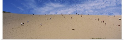 Tourists climbing a sand dune, Sleeping Bear Dunes National Lakeshore, Michigan