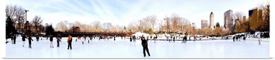 Tourists enjoying ice skating in an ice rink, Central Park, New York City