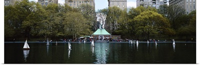 Toy boats floating on water, Central Park, Manhattan, New York City, New York State