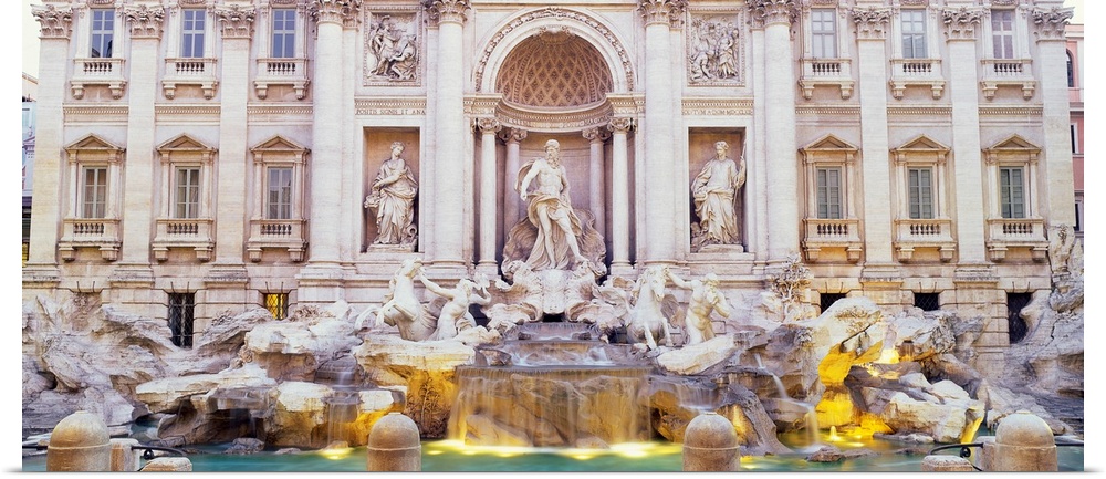 Photograph of the fountain from the front showing the entire sculpture arrangement in symmetry on this horizontal wall art.
