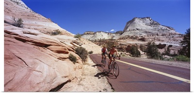 Two people cycling on the road Zion National Park Utah