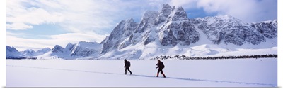 Two people skiing, The Ramparts, Amethyst Lake, Tonquin Valley, Jasper National Park, Alberta, Canada