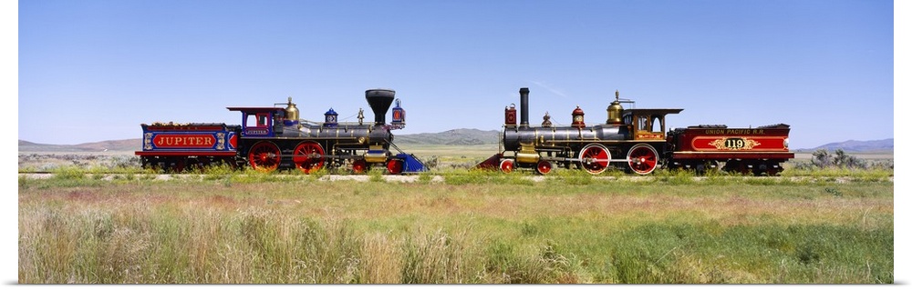 Two restored trains facing one another on opposite rails at Promontory Summit in Utah.