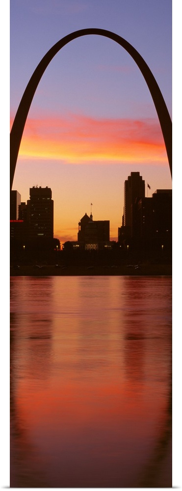 Vertical photograph on a big canvas of the Gateway Arch over St. Louis, Missouri, at sunrise.