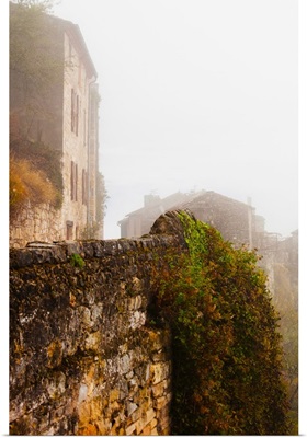 View of a town in fog, Cordes-sur-Ciel, Tarn, Midi-Pyrenees, France