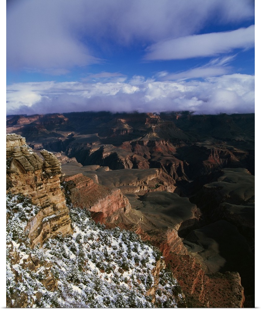 View of snow and storm clouds over Grand Canyon from Mather Point, south rim, Grand Canyon National Park, Arizona