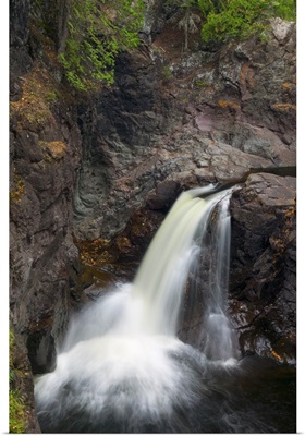 Water cascading over rocky cliff, Cascade River State Park, Minnesota