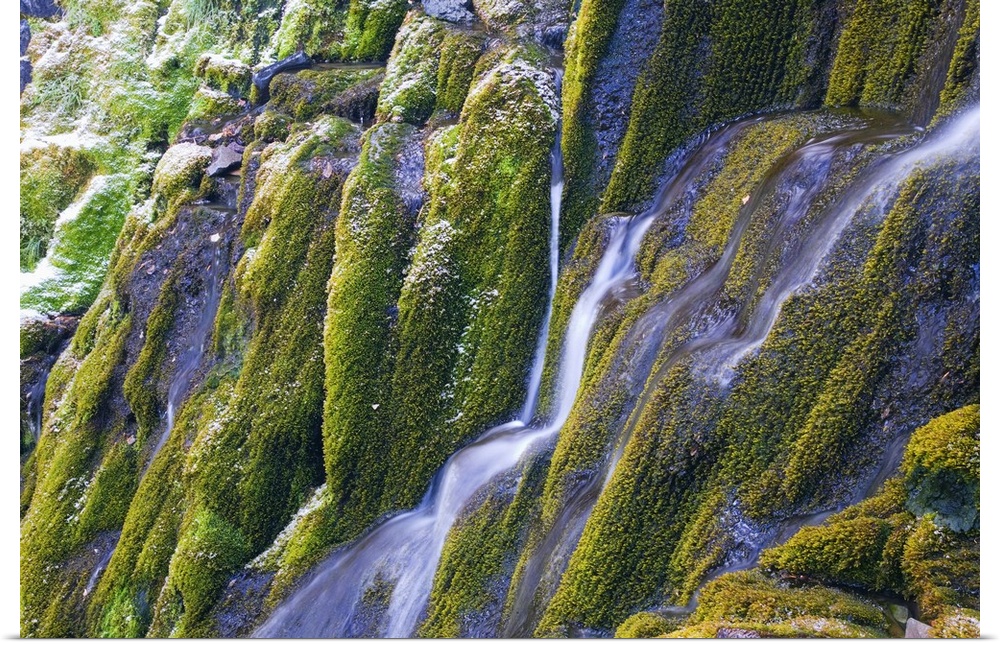 Water streaming down moss-covered cliffs, close up, Vidae Falls, Crater Lake National Park, Oregon