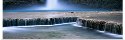 Waterfall in a forest Mooney Falls Havasu Canyon Havasupai Indian Reservation Grand Canyon National Park Arizona