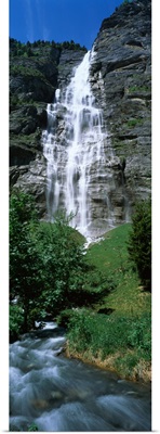 Waterfall in a forest Murrenbach Falls Lauterbrunnen Valley Bernese Oberland Berne Canton Switzerland