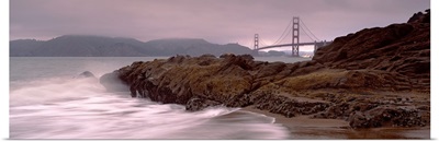 Waves breaking on rocks, Golden Gate Bridge, Baker Beach, San Francisco, California