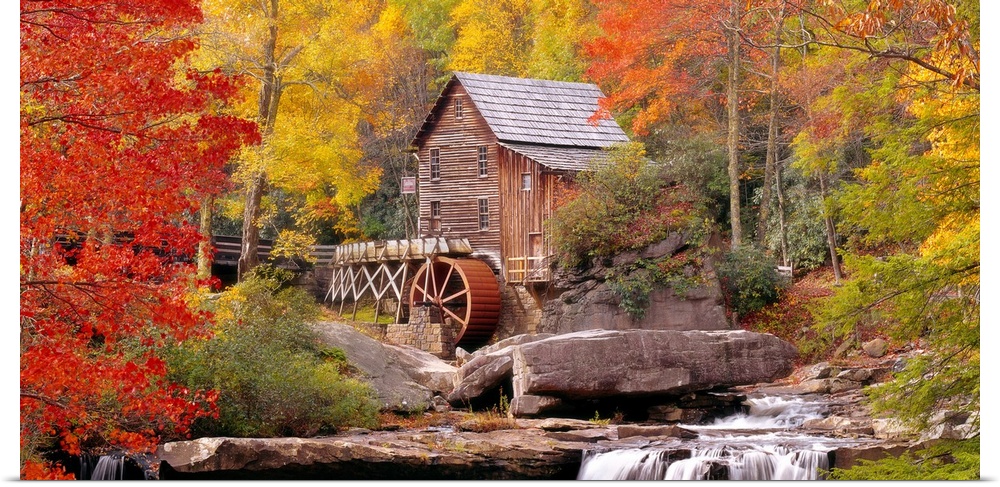 Panoramic photograph of the Glade Creek Grist Mill located within Babcock State Park in West Virginia.  The waterfall in t...