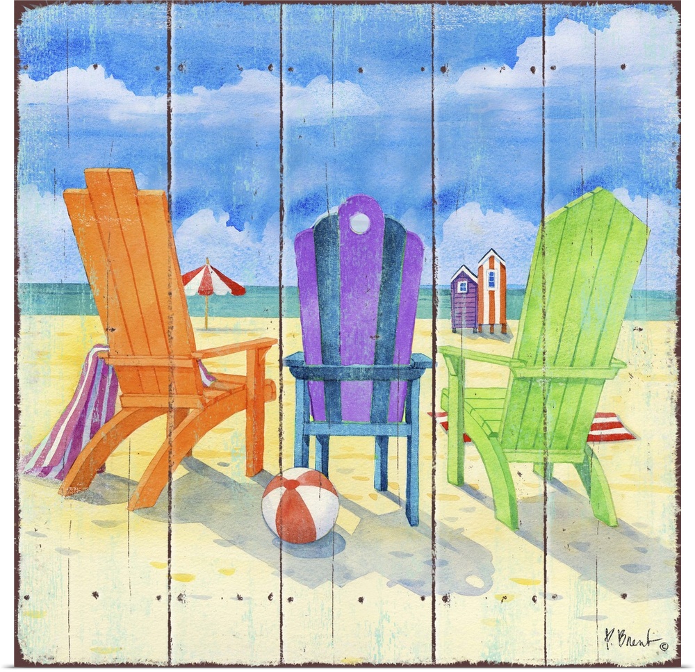Square decor of colorful beach chairs set up in the sand with the ocean in the background.