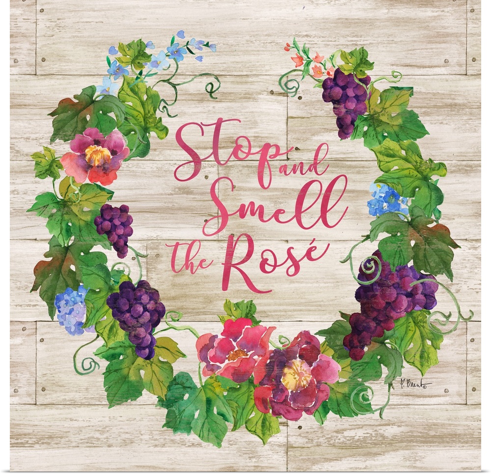 "Stop and Smell the Rose" written in the center of a floral wreath with grapes on a faux wood background.